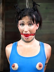 Normally we leave the electrical stimulation for afterward but for a veteran with as much practice in the bondage world as Wenona we can make an exception. We hook the electrodes to her milk cans after a brief Q and A and it's only a few seconds before the ache is showing on her face. Sobs, tears, and squeals all come right out. It's a beautiful way to start the day.