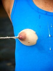 Normally we leave the electrical stimulation for afterward but for a veteran with as much practice in the bondage world as Wenona we can make an exception. We hook the electrodes to her milk cans after a brief Q and A and it's only a few seconds before the ache is showing on her face. Sobs, tears, and squeals all come right out. It's a beautiful way to start the day.