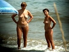 Hot nudists caught on tape regaling with water and sun