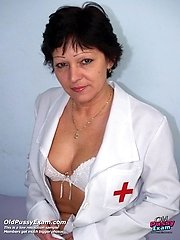 Mature head nurse Eva dildoing her wooly cooch at gyno office