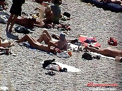 Slim middle-age woman was spotted around men nudists