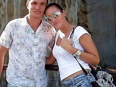 Beautiful brunette gf posing with her bf in a city - PrivateSexTapes.com