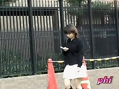 Small tempting oriental chick flashes her blue undies in hot sharking vid