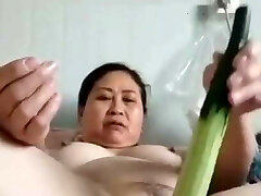 mature chubby Chinese girl with veggie