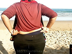 Wife shows her cleavage in the Outdoor Beach