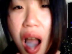 Asian babe jerking and fellating