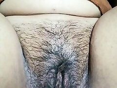 Indian Bitch with thick white vulva cums