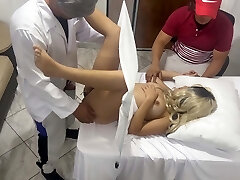 Weirdo Poses as a Gynecologist Doctor to Fuck the Jaw-dropping Wife Next to Her Dumb Husband in an Erotic Medical Consultation
