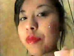 Japanese girl licking window