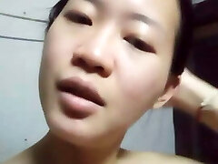 Asian nymph is bored at home alone