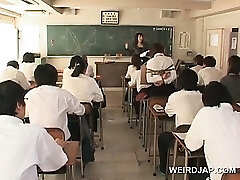 Asian college babe in ropes flashes twat upskirt in class