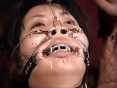 Jap Plus-size marionette got needles pierced lip to keep her mouth shut