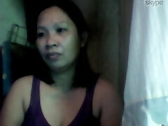 pretty filipina mom displaying me her nice tits on webcam on skype