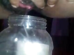 Sri Lankan Chick Pissing In a Bottle