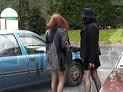 Two honeys demonstrating their tits and pussy in public place