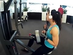 Fitness girl instructing biceps triceps