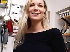 Outstanding German Milf with huge breasts dildoing her shaved muff in the kitchen