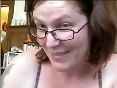 Short haired mature nerdy tart flashes her ugly milk cans and huge ass