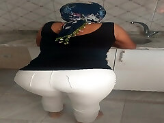 Turkish woman in white tights, skinny stockings, hijab