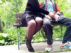 Unfamiliar Cougar in stockings jerked off my cock in the park on a bench