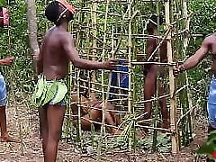 Somewhere in west Africa, on our annual jamboree, the king pounds the most uber-sexy maiden in the cage while his Queen and the guards are watching