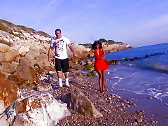 She has just turned 18 and Indiana Fox with her clean-shaved vagina is waiting to be boned by the ample cock on a beach