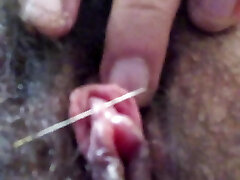 piercing à l'aiguille du clitoris