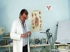 Old female Mila visiting gyno doctor for vag speculum examination on gynochair