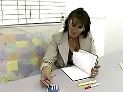 Mature lecturer with student