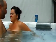Mature couple having an extraordinaire sex experience in their pool
