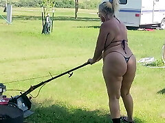 Got back to find wife mowing in a g-string bathing suit, her ass and thighs jiggling with every step 