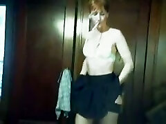 This wicked Milf in sexy mini-skirt loves to smoke and she masturbates a lot