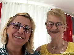 Blonde grannies Milli and Beata finger and toy each other's shaved poons