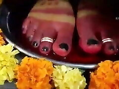 Indian mistress has her feet worshipped by slave