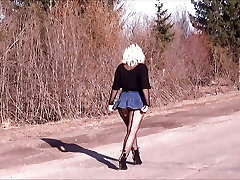 Jeans skirt and black pantyhose-Stunning walk big ass