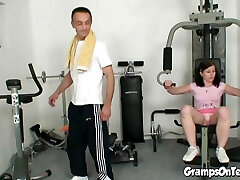 Fit gym teenage rides oldie in cowgirl pose
