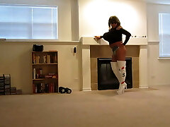 Busty Crossdresser in Bootie Shorts and Boots