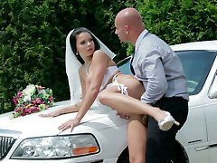 Extravagant bride Victoria Blaze gets doggyfucked over the limousine