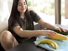 Naughty Nadine masturbates with trio different fruits