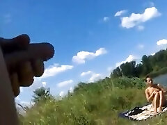 Dickflash - Tugging for a topless sunbather .360p