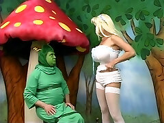 Sexy Alice with hefty mounds gets lost in wonderland and plays with a caterpiller