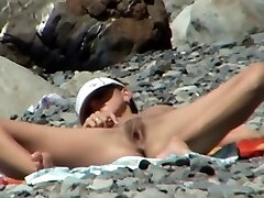 Dame mounted on a beach