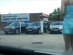 Filming handsome skanky tranny on the parking plenty of in different clothes