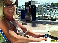 Horny milf with in a bikini fucks hard on a mind-blowing yacht