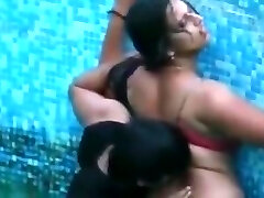 Indian aunt in pool bra and thong Indian aunt in pool bra and thong