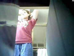 Spy cam movie of a naked pussy in the bathroom