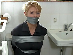 Platinum-blonde housewife in bathroom