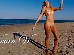 Naked Workout on the beach - a wondrous skinny milf with small tits