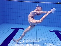 Killer Elena Proklova once again gets completely naked in the pool