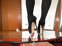 Mistress Elle in high heels hip boots ravage her slaves cock